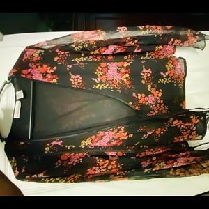 100% silk wrap blouse and skirt. EUC condition. No holes or rips.